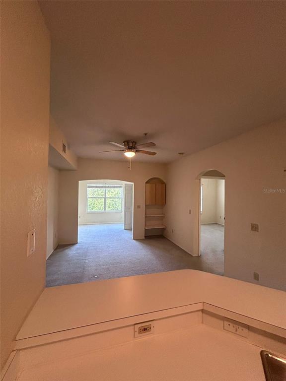 832 Camargo Way, Unit 303 Altamonte Springs, FL 32714 - Photo 11 of 27 a view of empty room with windows
