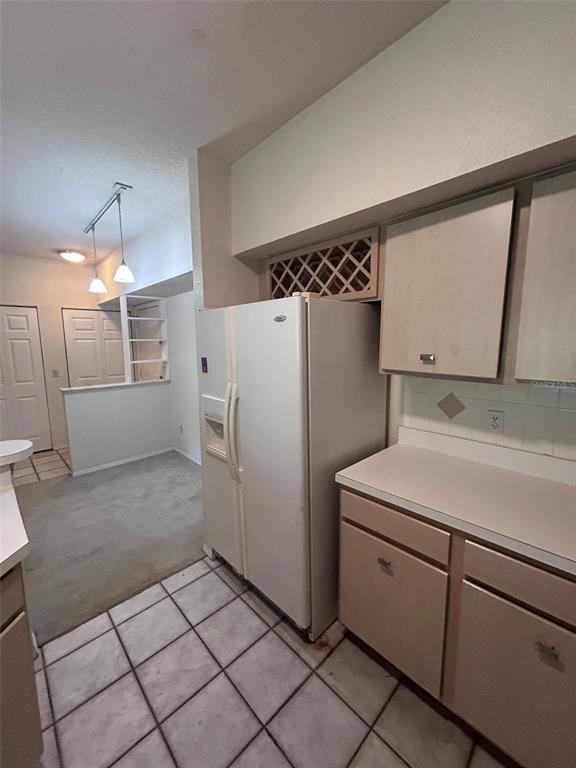 832 Camargo Way, Unit 303 Altamonte Springs, FL 32714 - Photo 13 of 27 a utility room with cabinets and washer dryer