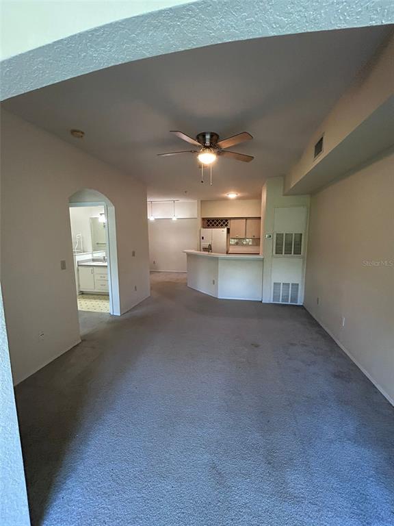 832 Camargo Way, Unit 303 Altamonte Springs, FL 32714 - Photo 15 of 27 a view of a kitchen and a empty room