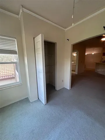a kitchen with kitchen island a sink appliances and cabinets