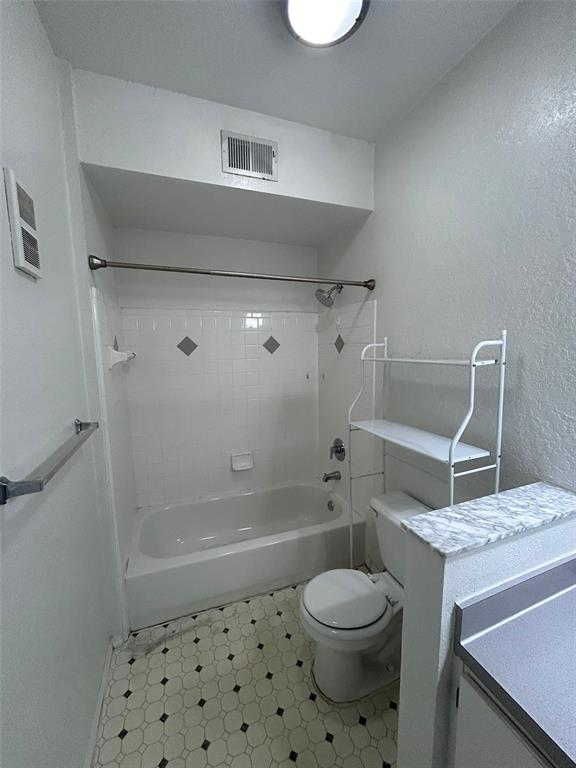 832 Camargo Way, Unit 303 Altamonte Springs, FL 32714 - Photo 21 of 27 a bathroom with a sink a toilet and shower