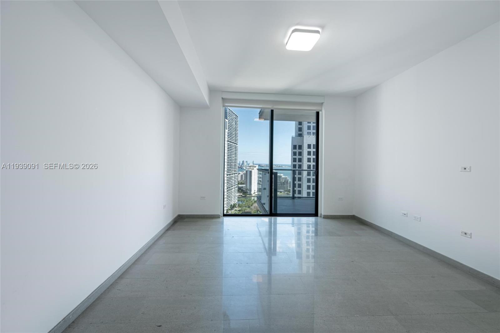 68 Southeast 6th Street, Unit 2507 Miami, FL 33131 - Photo 12 of 47 Master Bedroom