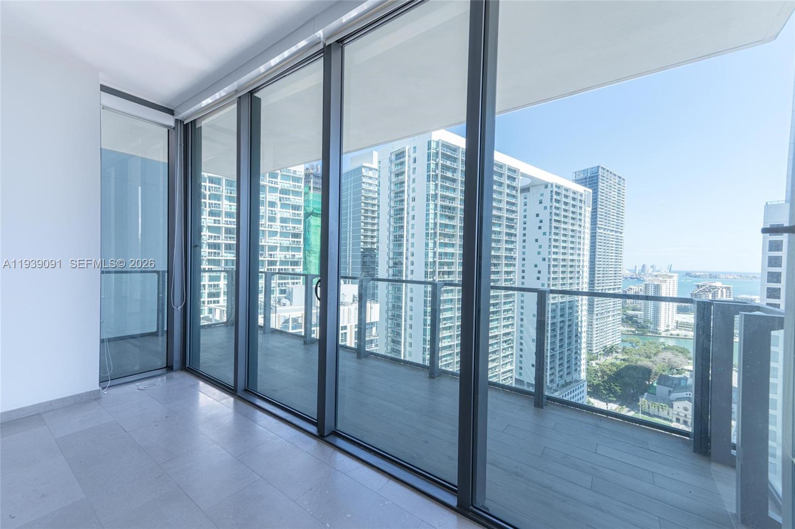 68 Southeast 6th Street, Unit 2507 Miami, FL 33131 - Photo 3 of 47 a view of balcony with floor to ceiling window