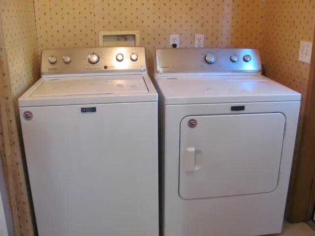 a utility room with dryer and washer
