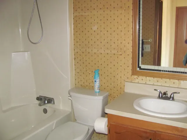 a view of a room that has a fan