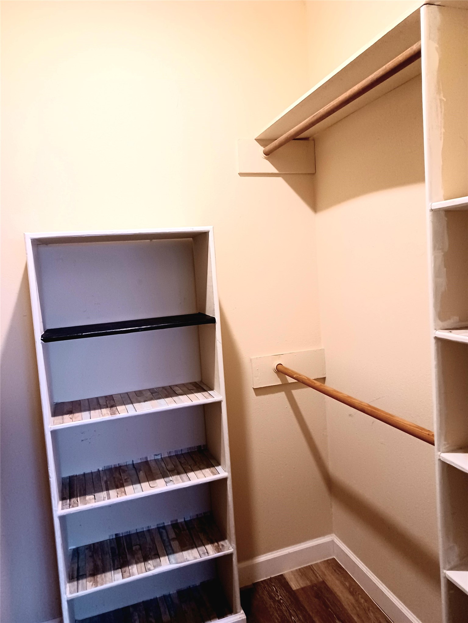 128 April Point Drive South Conroe, TX 77356 - Photo 15 of 26 a view of walk in closet with empty racks