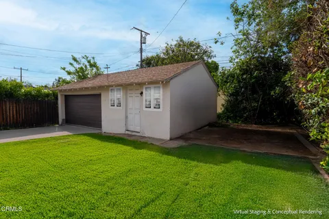 a house view with a garden space