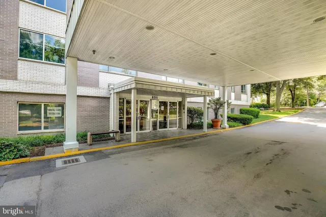 a view of a building with a street