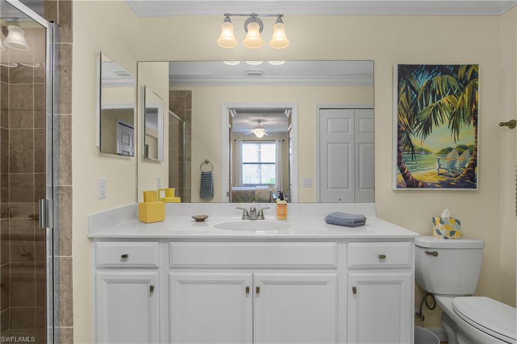 9572 Trevi Court, Unit 5034 Naples, FL 34113 - Photo 18 of 47 Primary Bathroom