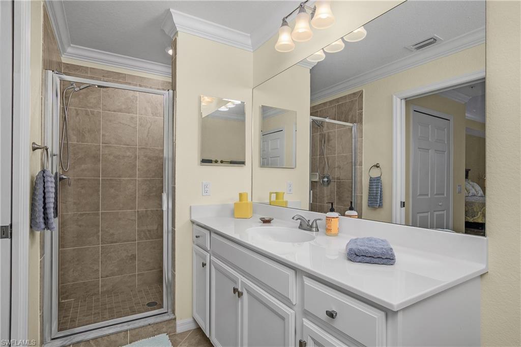 9572 Trevi Court, Unit 5034 Naples, FL 34113 - Photo 19 of 47 Primary Bathroom