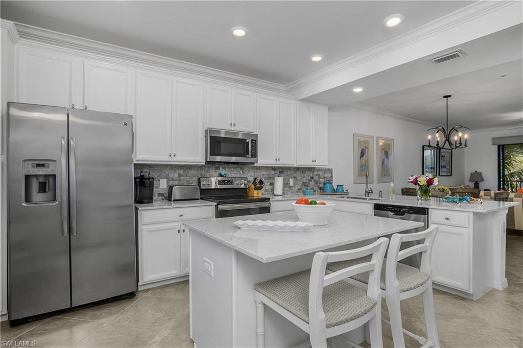 9572 Trevi Court, Unit 5034 Naples, FL 34113 - Photo 5 of 47 Kitchen