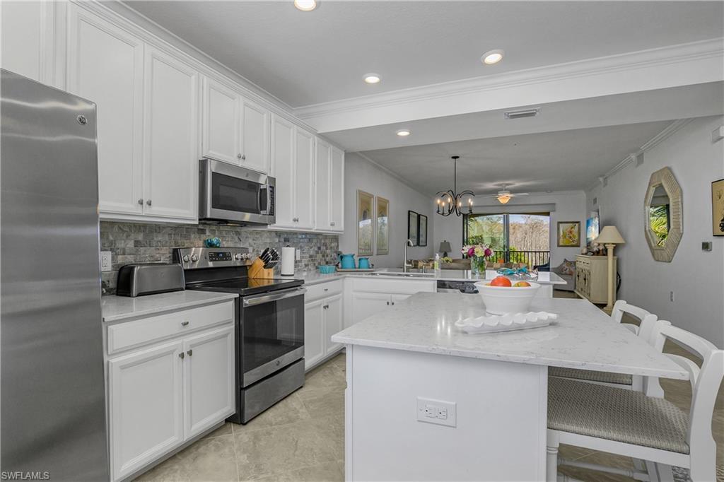 9572 Trevi Court, Unit 5034 Naples, FL 34113 - Photo 7 of 47 Kitchen