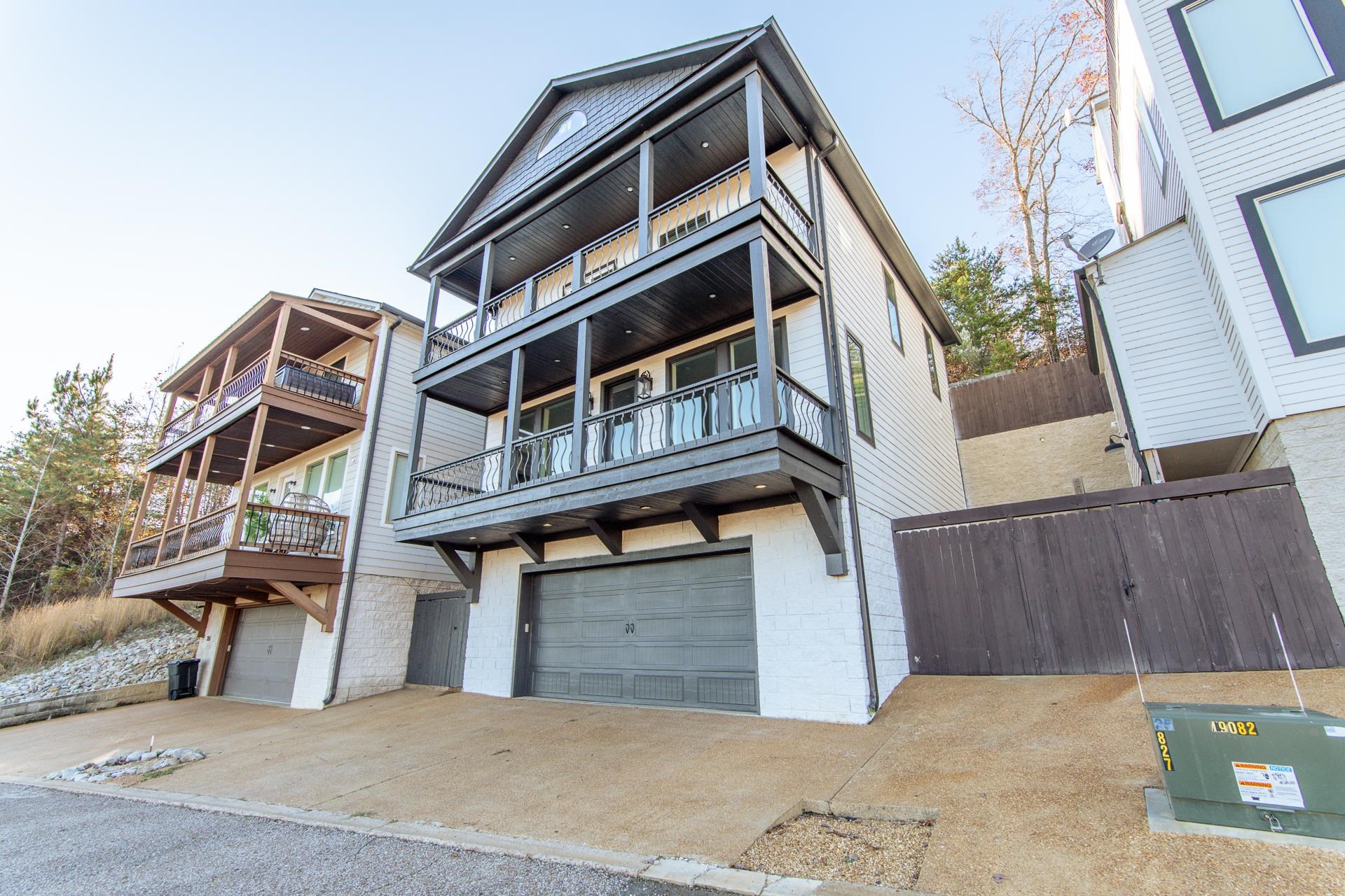 357 High Pointe Drive Savannah, TN 38372 - Photo 12 of 40 Home is new as of 12/2024! CUSTOM FINISHES THROUGHOUT! Beautiful Views, boat slip with lift and party deck, elevator, generator and so many features!