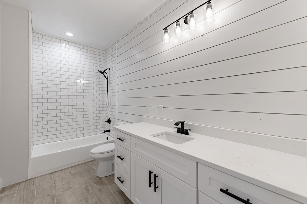 219 Fairview Drive Morganton, GA 30560 - Photo 41 of 61 a bathroom with a sink a toilet and shower