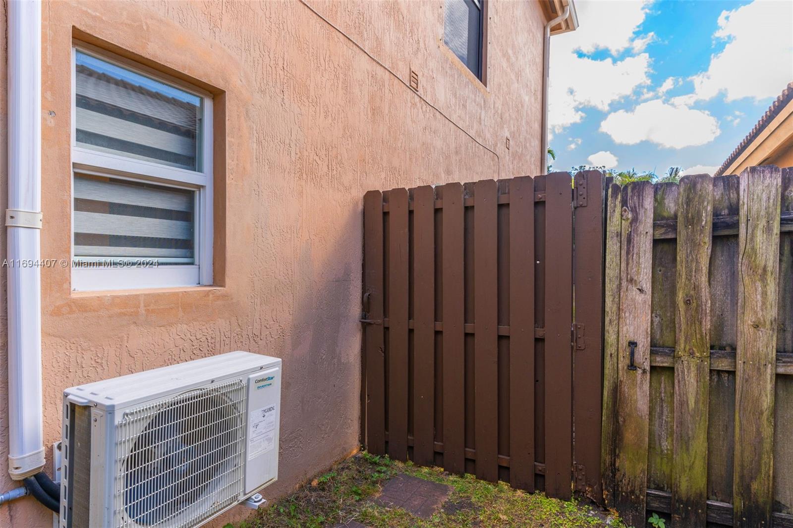 2012 Southeast 15th Street, Unit 1 Homestead, FL 33035 - Photo 11 of 12 a view of a wooden door