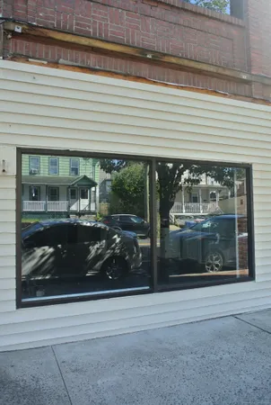 a front view of a house with a porch