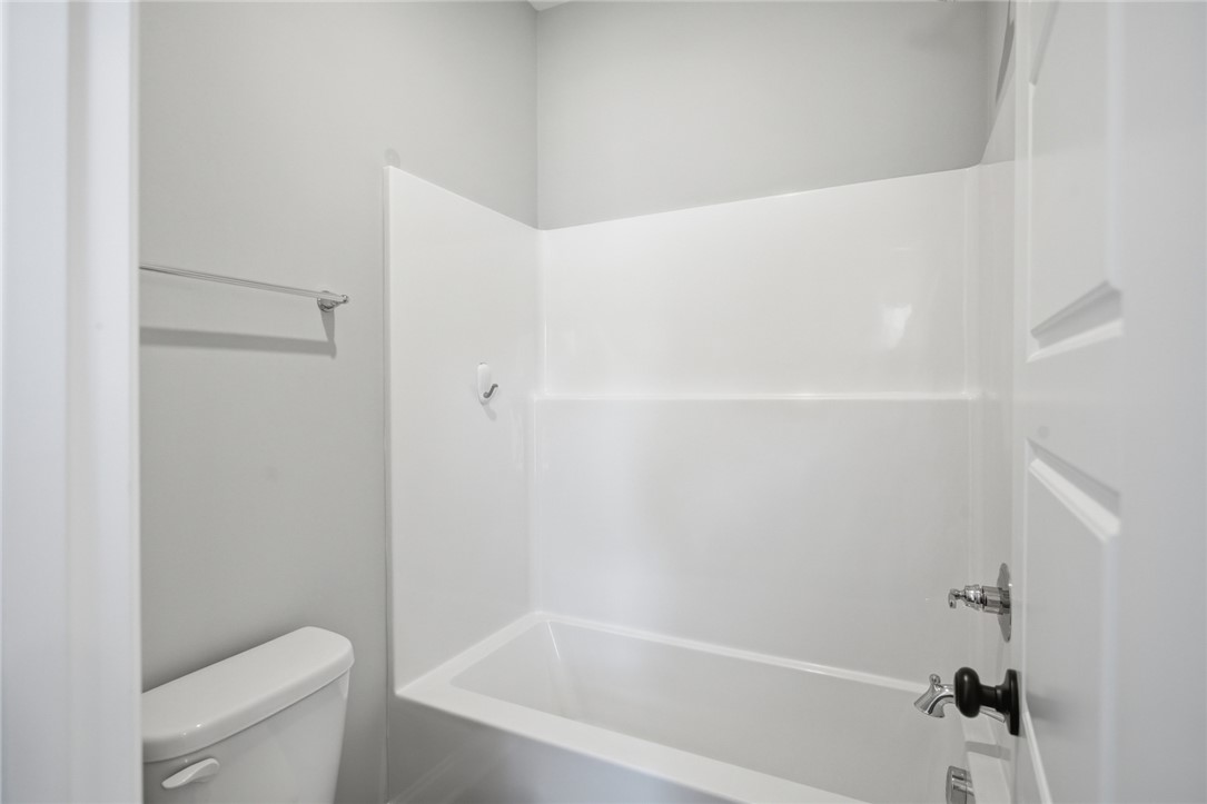 912 Watercrest Road West Union, SC 29696 - Photo 33 of 49 This bathroom features a sleek, modern bathtub with a clean, functional design.