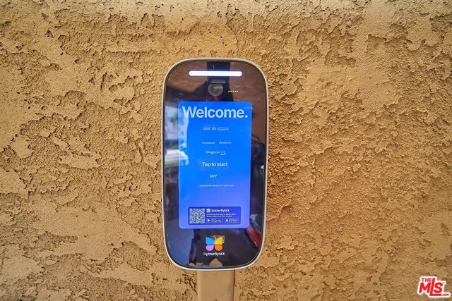 a brick building with a sign on it