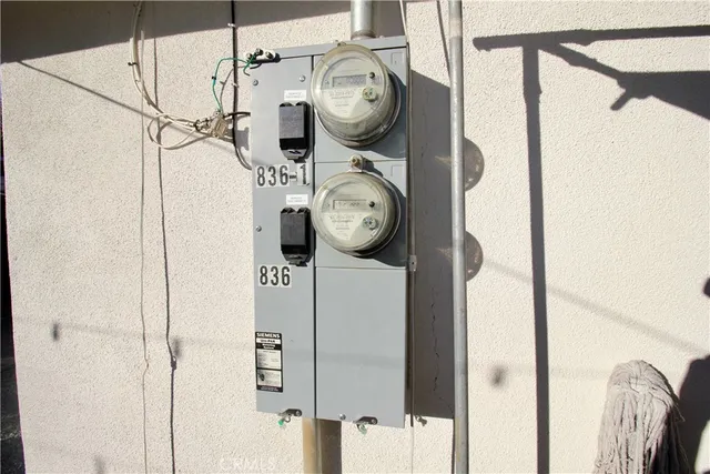 a close view of meter board on wall