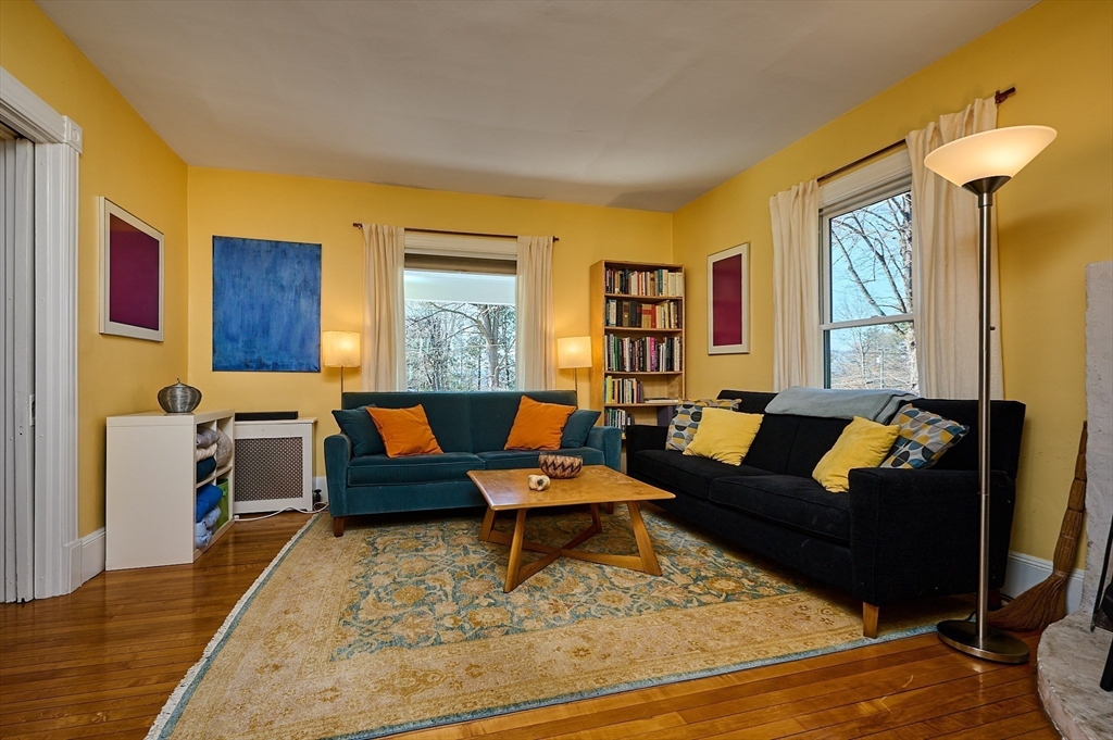 16 South Sunset Avenue Amherst, MA 01002 - Photo 12 of 42 a living room with furniture and a window