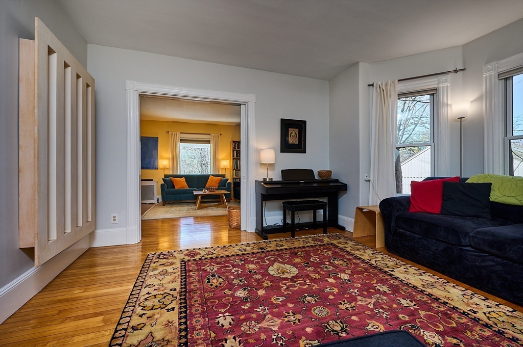 16 South Sunset Avenue Amherst, MA 01002 - Photo 14 of 42 a living room with furniture and a fireplace
