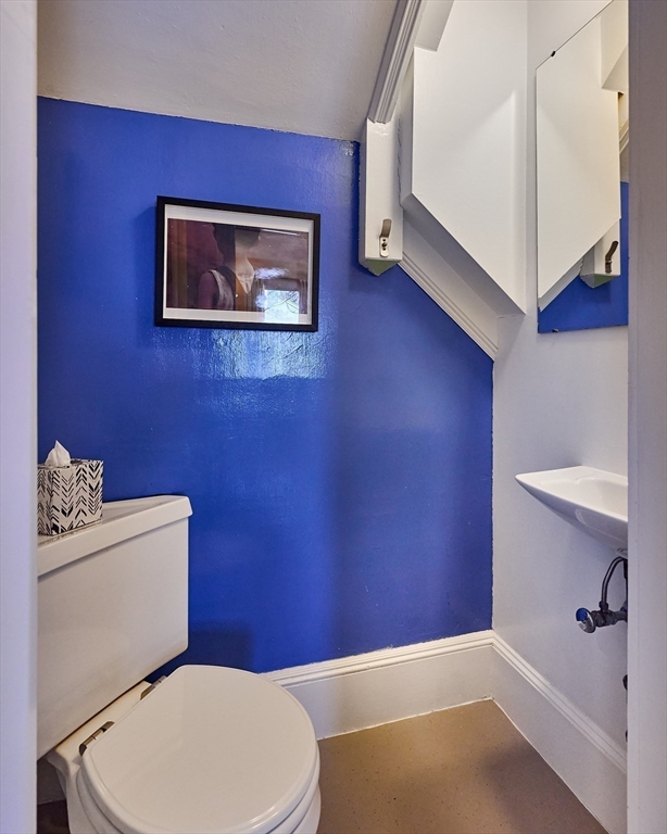 16 South Sunset Avenue Amherst, MA 01002 - Photo 16 of 42 a bathroom with a toilet a sink and a bathtub