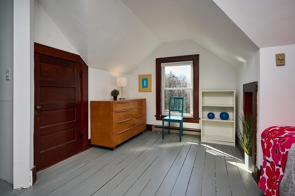 16 South Sunset Avenue Amherst, MA 01002 - Photo 23 of 42 a living room with furniture and large windows