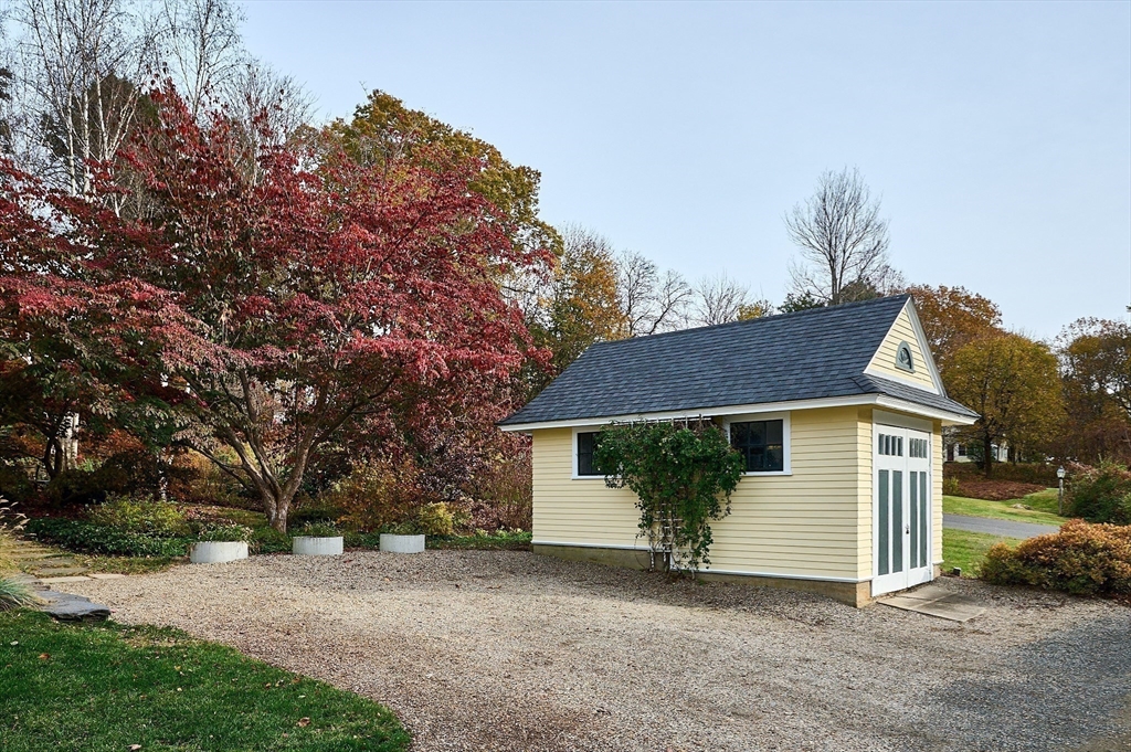 16 South Sunset Avenue Amherst, MA 01002 - Photo 35 of 42 a front view of a house with a garden