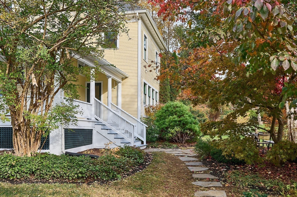 16 South Sunset Avenue Amherst, MA 01002 - Photo 38 of 42 a view of a white house with a tree