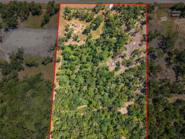 a view of a garden with an outdoor space