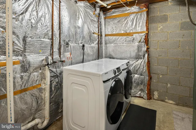 a bathroom with a sink vanity and a mirror