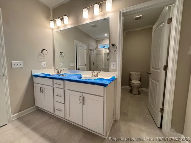 a view of large swimming pool and outdoor space