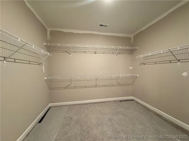 a view of dinning room with furniture and window