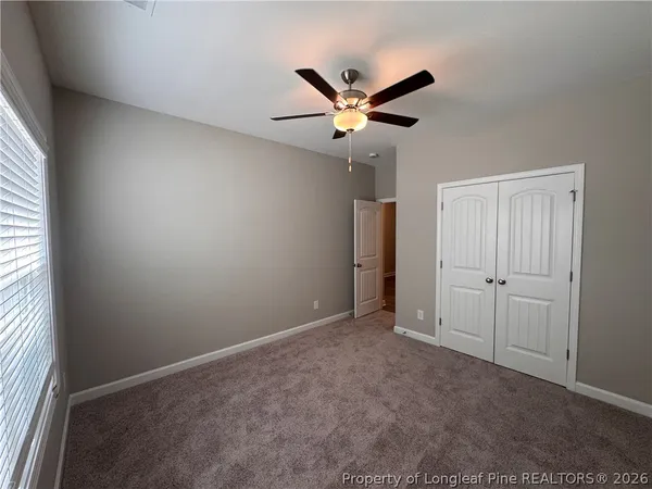 a large kitchen with kitchen island a sink dishwasher a stove a dining table and chairs