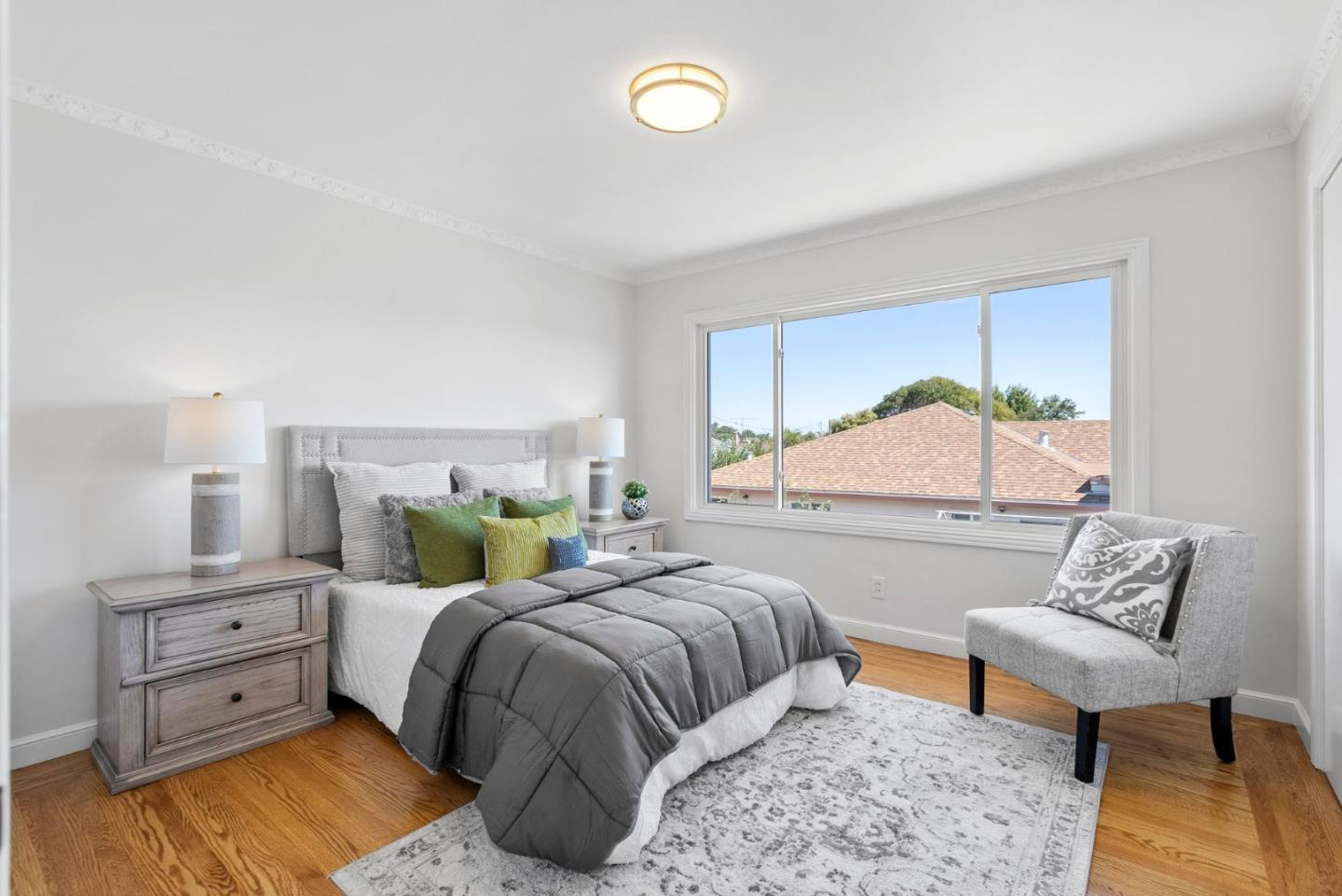 604 Geraldine Drive Millbrae, CA 94030 - Photo 18 of 33 a bedroom with a bed and window