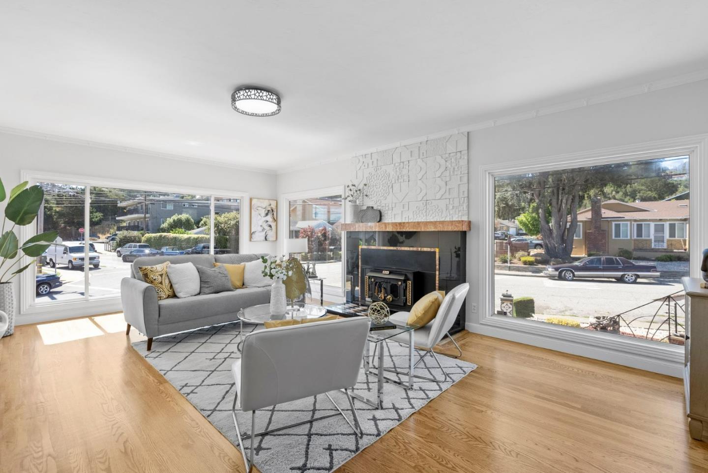 604 Geraldine Drive Millbrae, CA 94030 - Photo 4 of 33 a living room with fireplace furniture and a large window