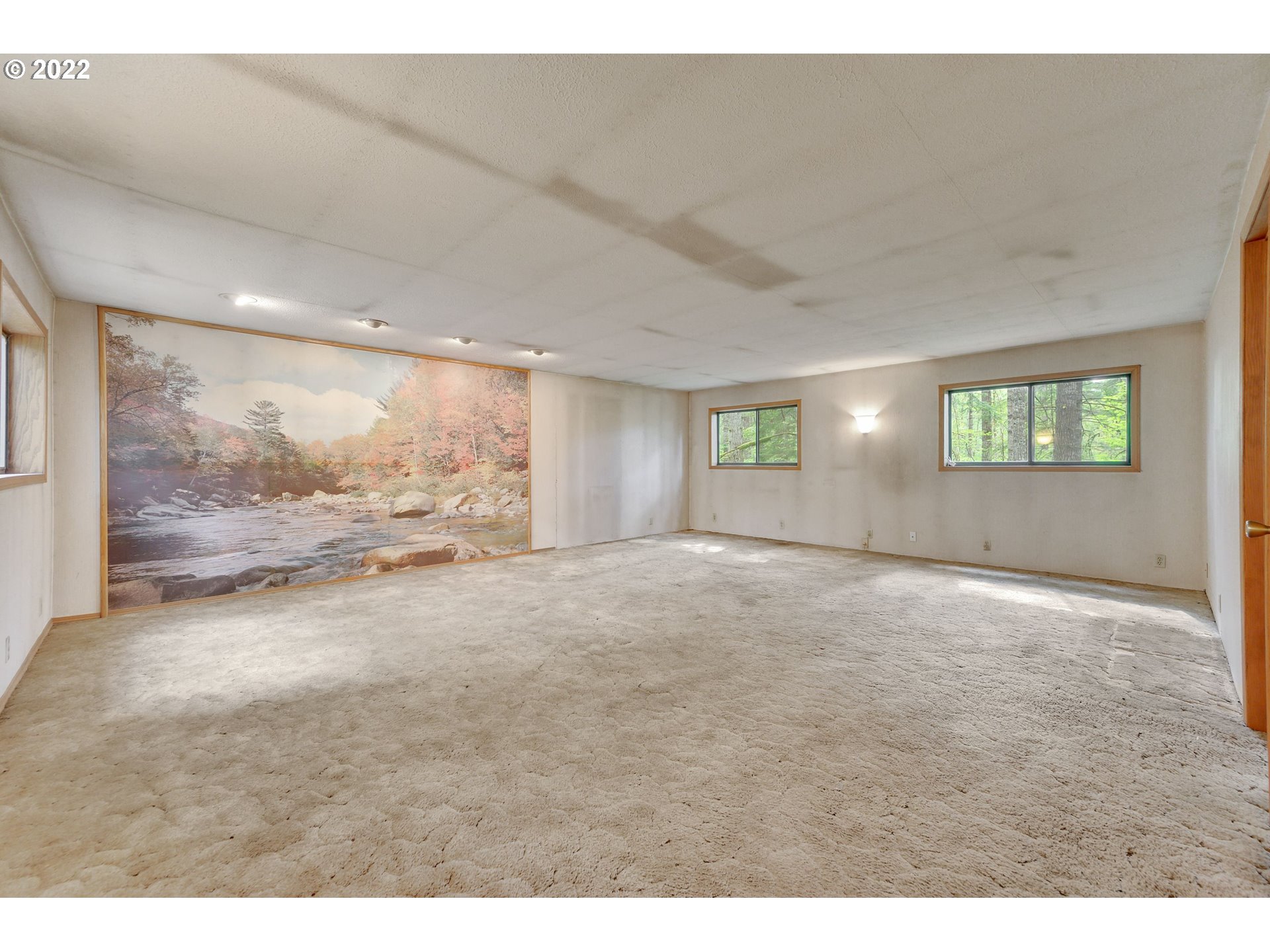 30665 South Partridge Road Colton, OR 97017 - Photo 13 of 20 a view of an empty room with wooden floor and a window