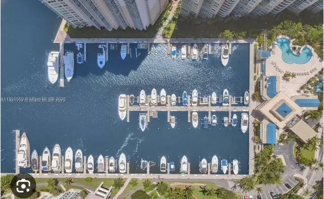 a front view of a house with sitting area