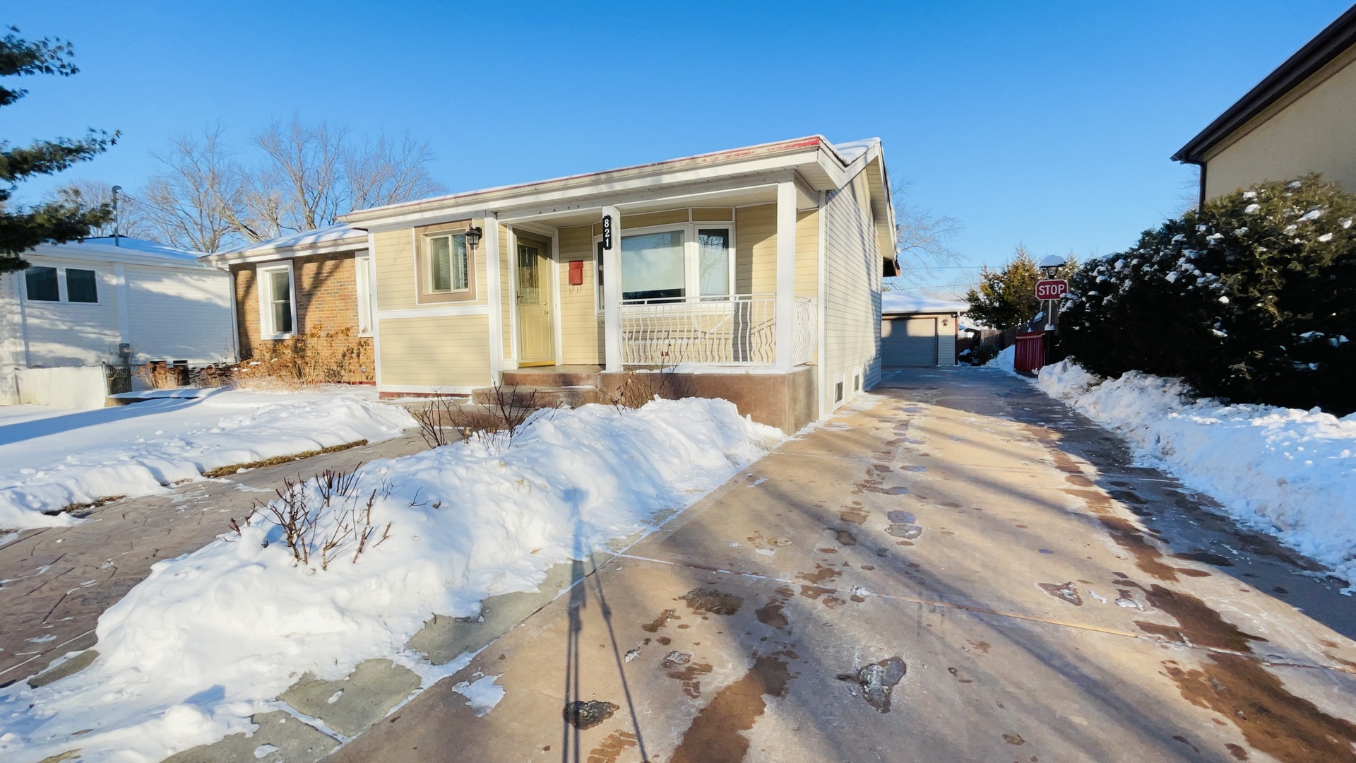 a view of a house with a snow