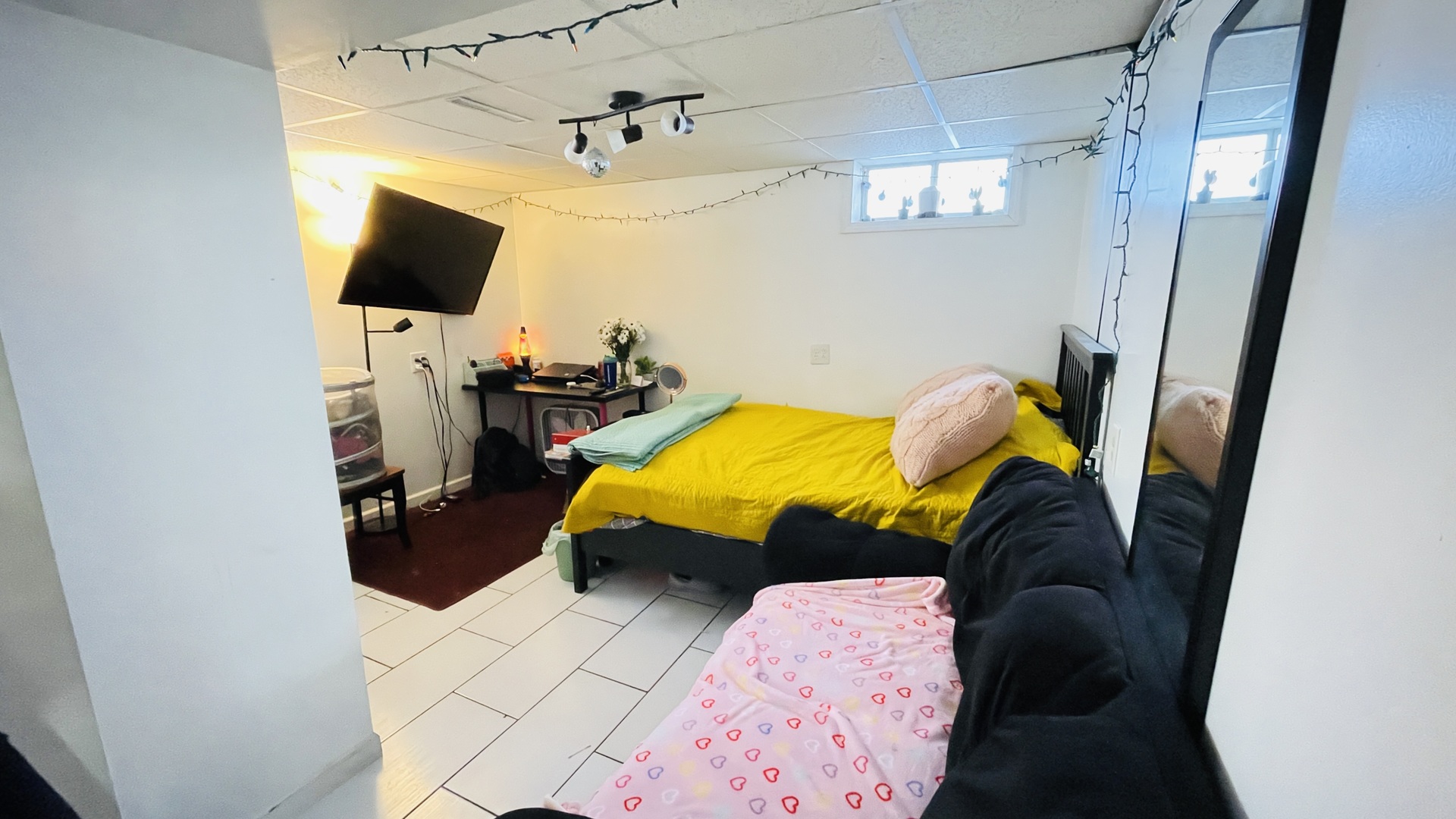 Undisclosed Address Addison, IL 60101 - Photo 14 of 26 a bed room with a bed and a television