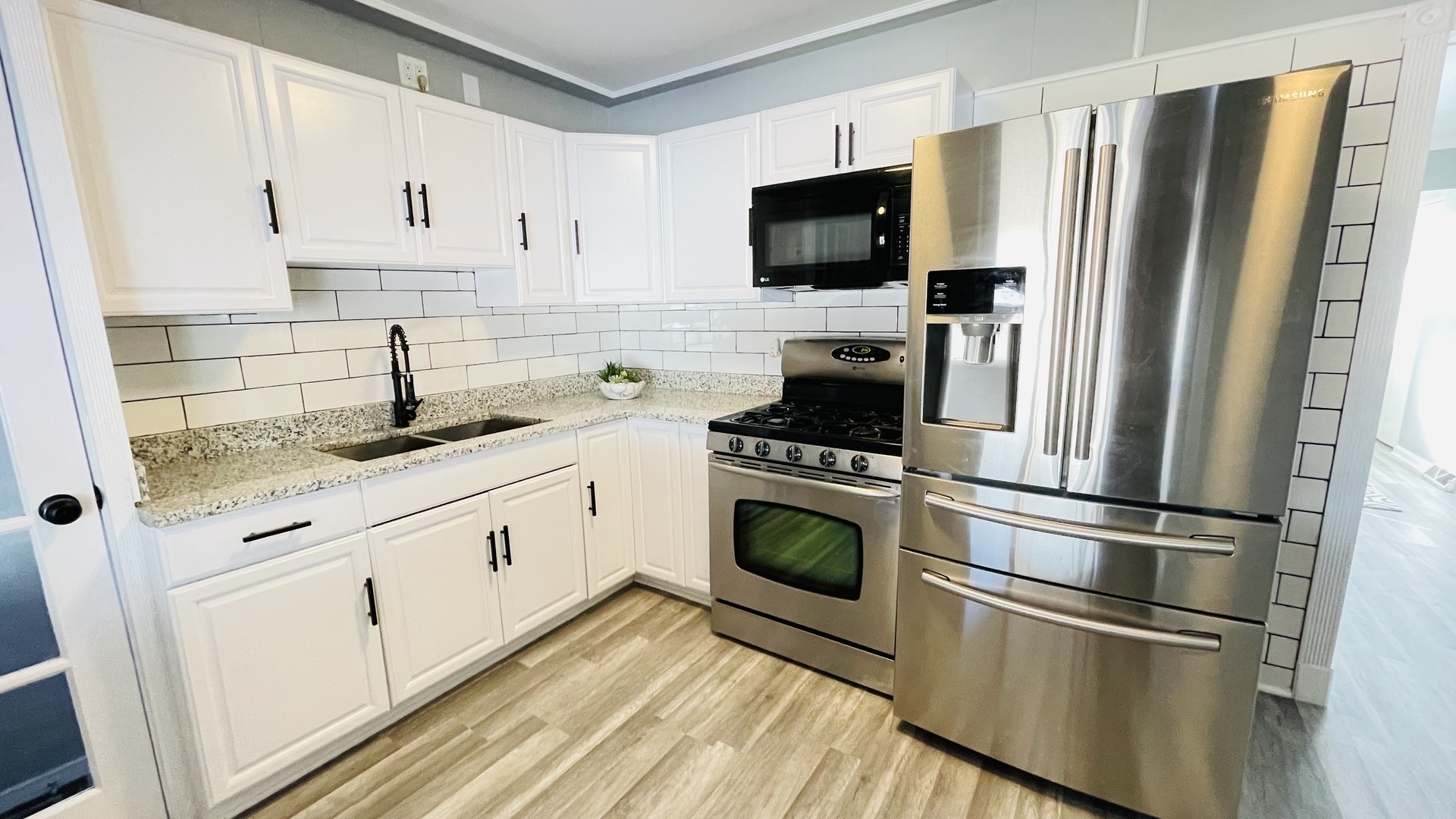 Undisclosed Address Addison, IL 60101 - Photo 6 of 26 a kitchen with refrigerator a stove and a refrigerator