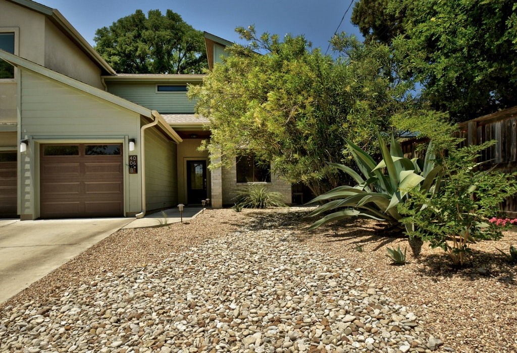 4006 Valley View Road, Unit B Austin, TX 78704 - Photo 1 of 1 a front view of a house with a yard
