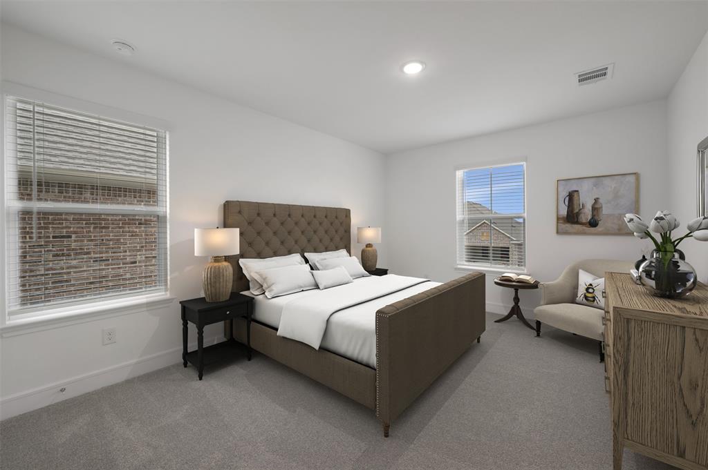 1004 Ashcroft Lane Justin, TX 76247 - Photo 21 of 39 a bedroom with a bed and a couch