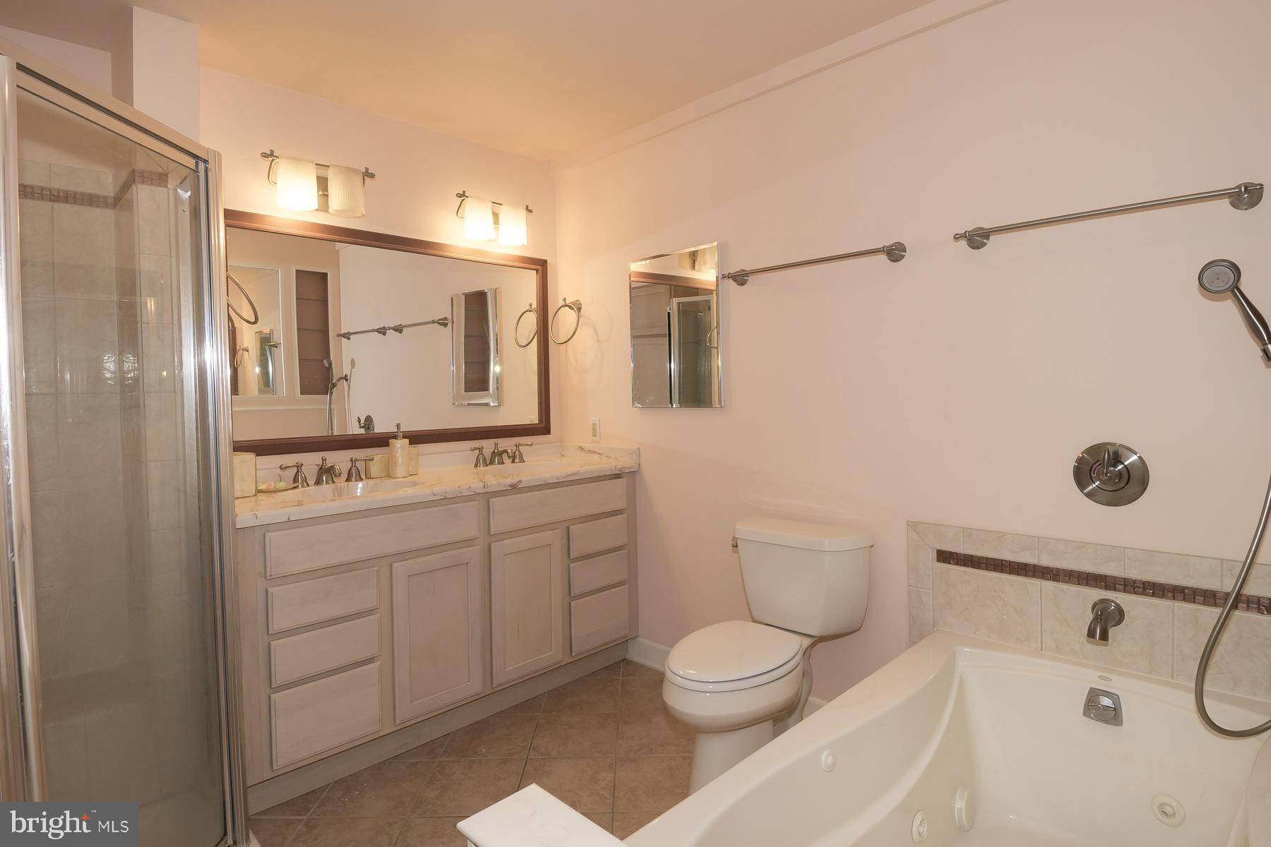 5611 Vantage Point Road Columbia, MD 21044 - Photo 15 of 28 Heated ceramic floor, new vanity, shower, tub