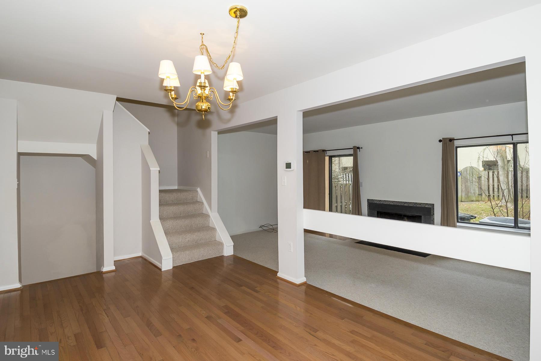 5611 Vantage Point Road Columbia, MD 21044 - Photo 9 of 28 Dining Room looking over Living Room, Side Stairs