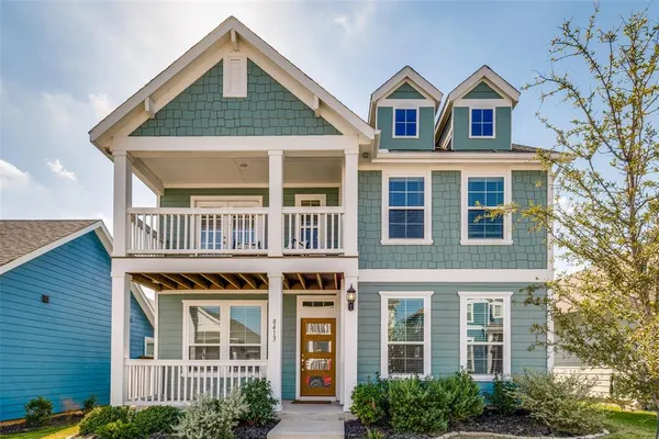 a front view of a house with balcony