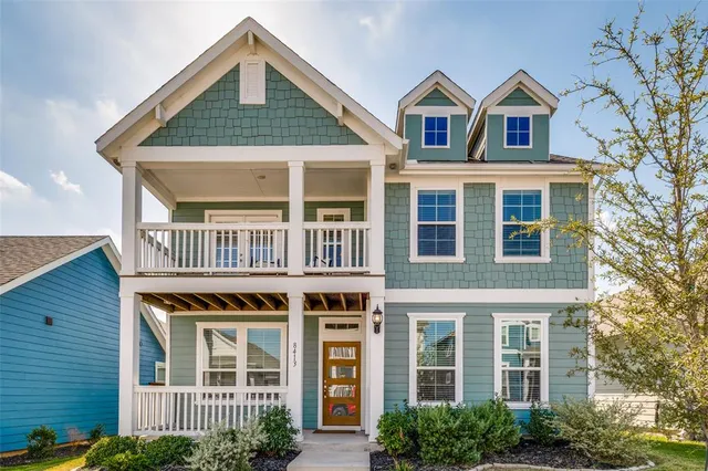a front view of a house with balcony