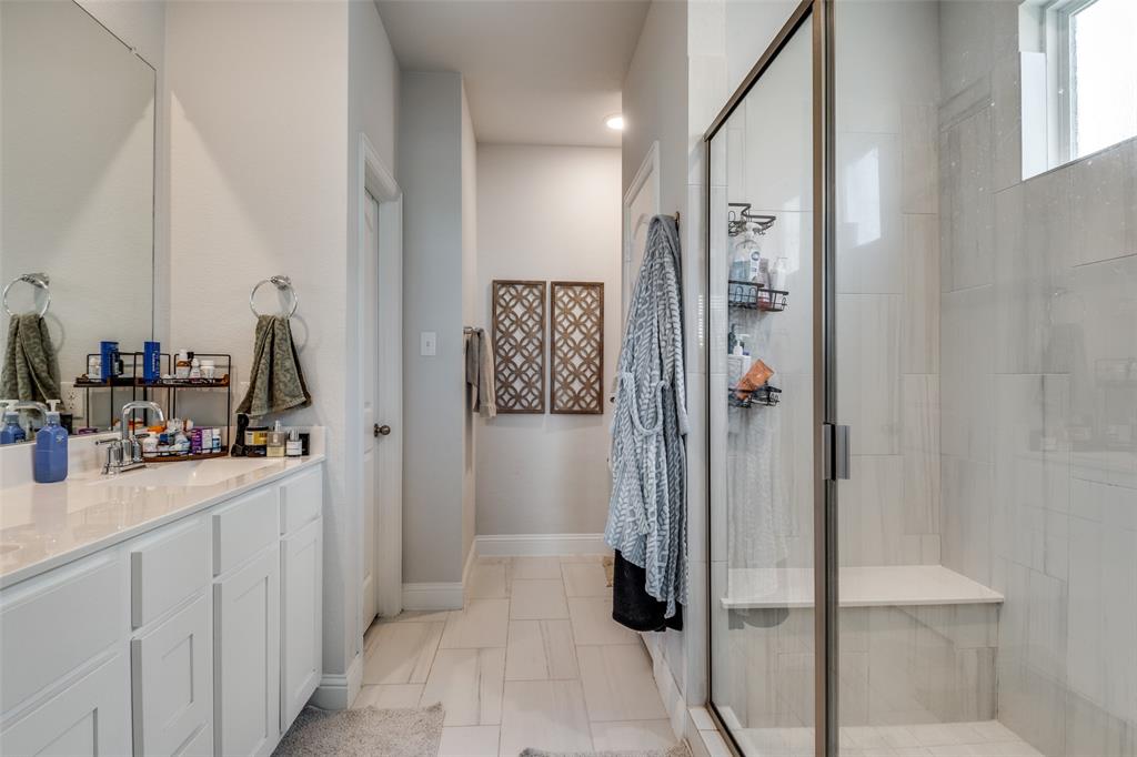 8413 Alba Lane Rowlett, TX 75089 - Photo 15 of 25 a view of a bathroom from a hallway