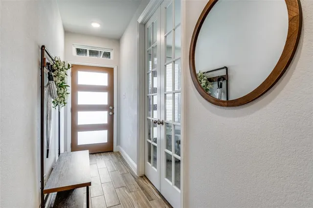a view of a livingroom from a hallway