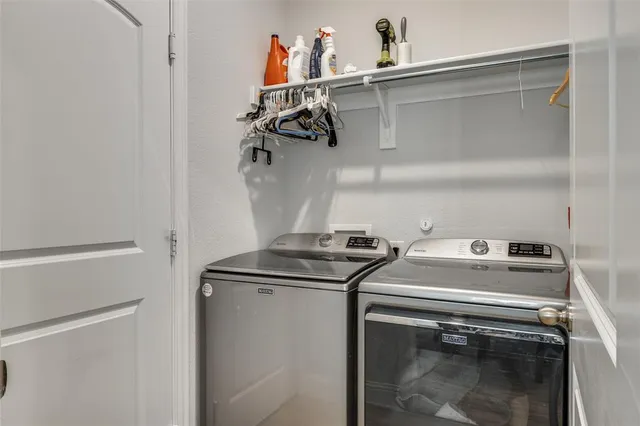 a porch with a bench next to a window